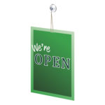 Deflecto Suction Cups with Hooks (Set of 6) holding a "We're open" sign on glass