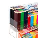 Deflecto 2-Tier Acrylic Counter Display – close-up filled with coloured pencils
