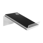 Deflecto Flat Angled Display Stand displaying a black spiral notebook